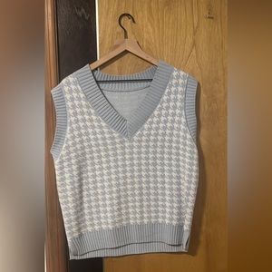 Blue and white checkered sweater vest